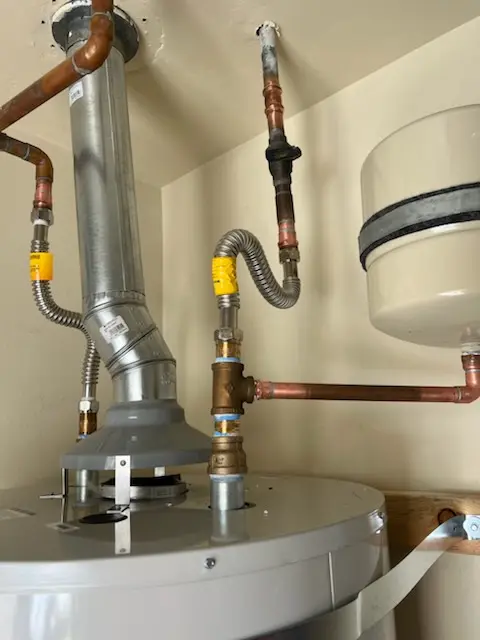 Water heater installation and plumbing repair in Bexton